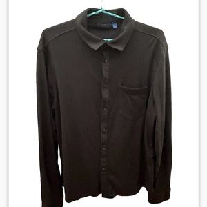 Long sleeve plaid, men’s button down shirt with one pocket in the front